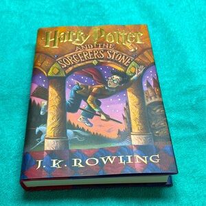 Harry Potter and the Sorcerer's Stone Hardcover and The Chamber of Secrets.